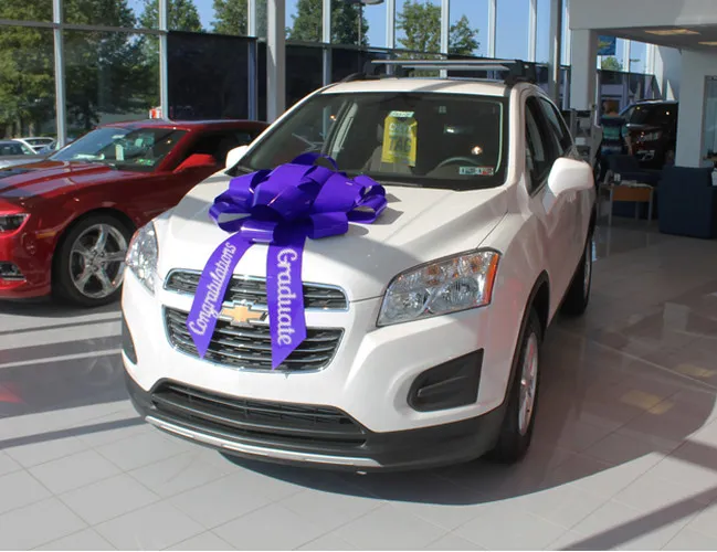 30-inch purple magnetic car bow with Congratulations Graduate lettering