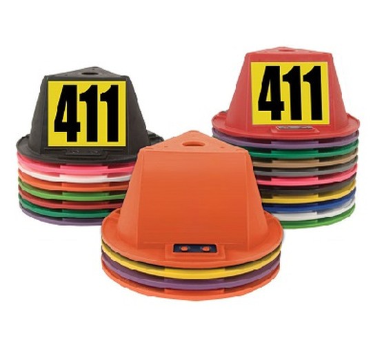Stacks of magnetic car top hats in assorted colors with black 411 number decals on yellow backgrounds