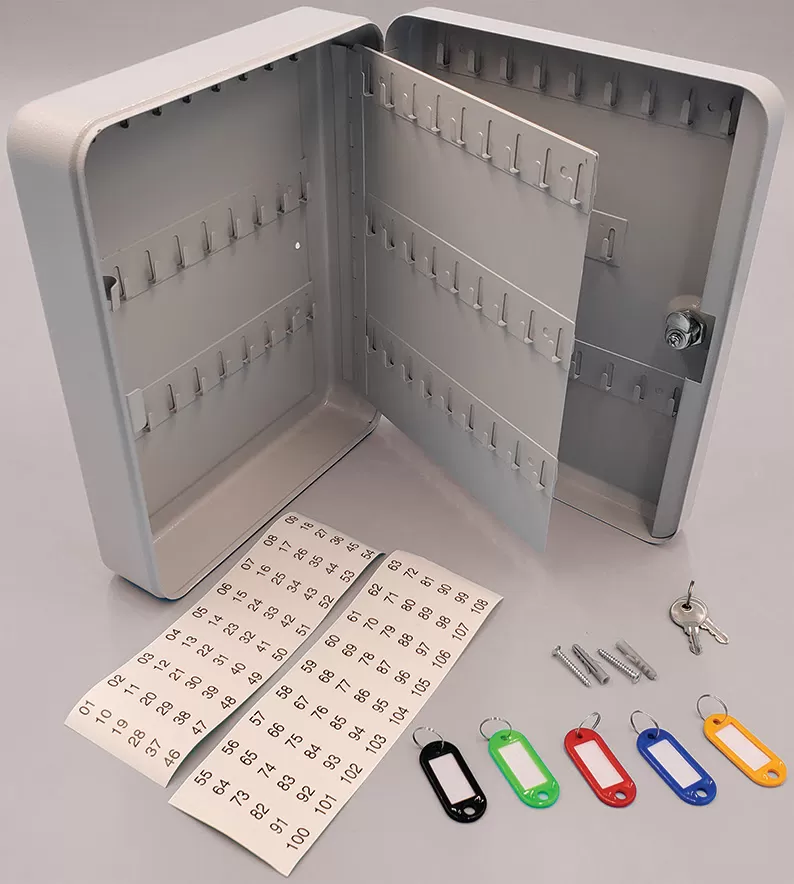 Open gray 106-key cabinet with center panel, numbered stickers, colored key fobs, keys and mounting screws