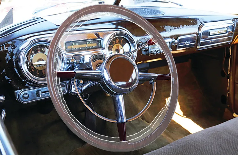 Extra-large double-elastic cover protecting an oversized steering wheel rim