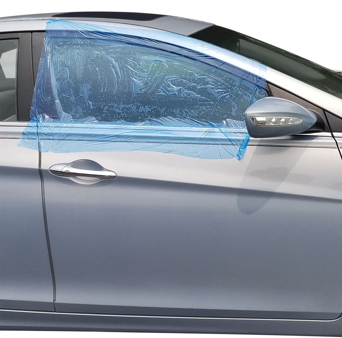 Blue-tinted collision wrap covering the front side window of a silver car