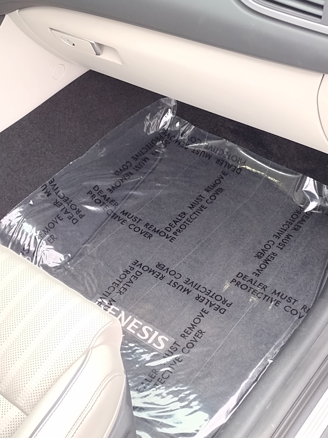 Clear 3 mil adhesive floor mat protecting vehicle carpet, printed Dealer Must Remove Protective Cover