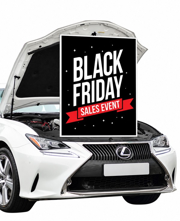 Black Friday Sales Event underhood sign displayed vertically beneath an open vehicle hood