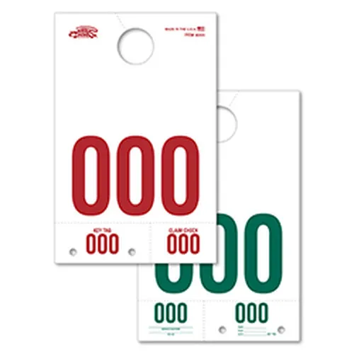 Long white service dispatch tags showing red front and green back numbering