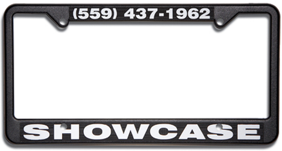 Black custom raised-letter license plate frame with white SHOWCASE lettering and phone number
